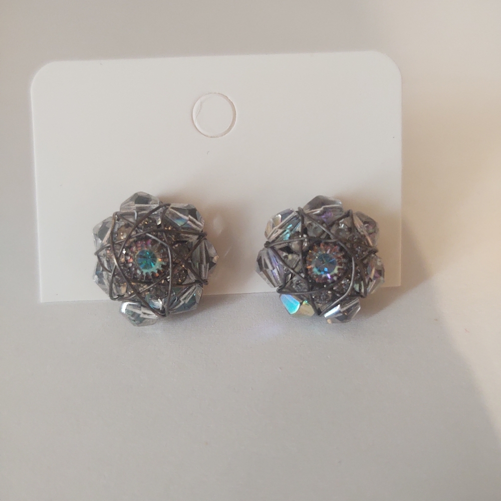 Silver flower earrings.